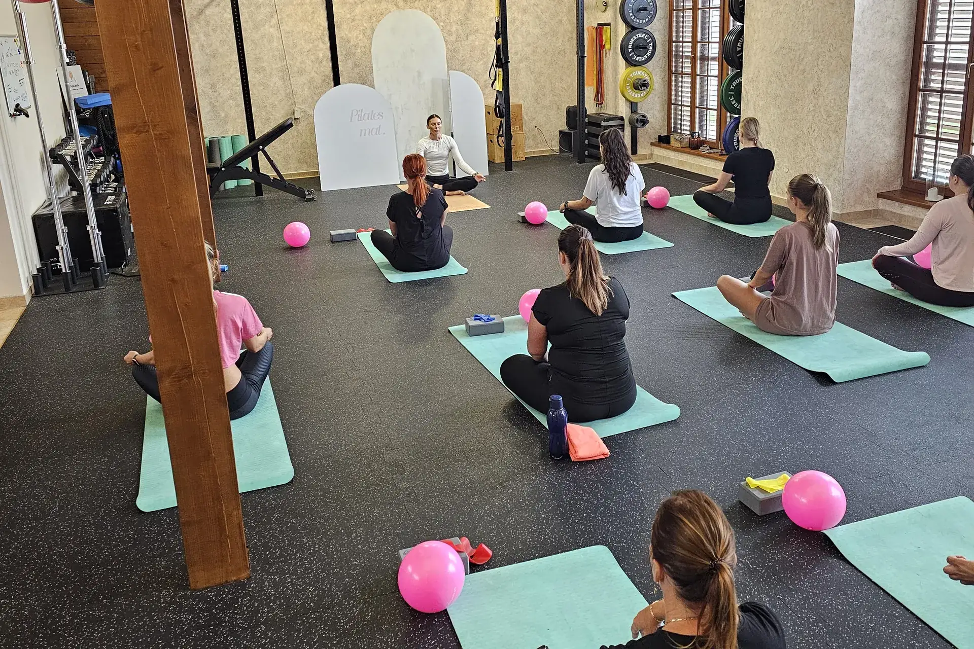 Group Pilates class at fitplus.studio